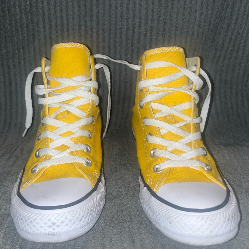 Yellow high top converse